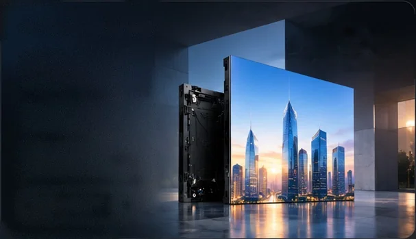 KAN Universal SMD LED cabinet beside a bright video wall showing a blue-hour city skyline